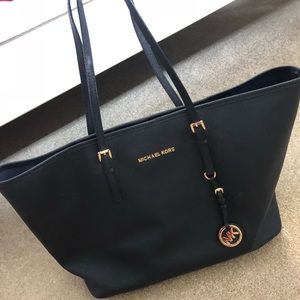 Large black Michael Kors leather tote purse